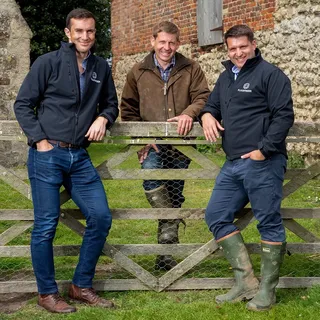 FlockFinder founders James, Tommy and Ed recreating the family photograph on the farm